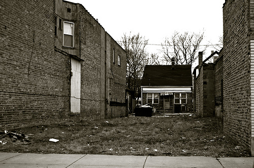 House behind vacant lot, 2008, by Samuel A. Love, CC by-NC-ND 2.0