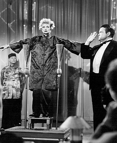 Lucille Ball and Orson Welles.From a 1956 episode. Public domain.