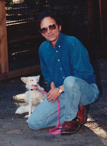 Exercising Vixen the fox while a volunteer at the Folsom City Zoo, ca. 1996. She was a sweetheart, though a bit of a drama queen. Is this the enemy? 